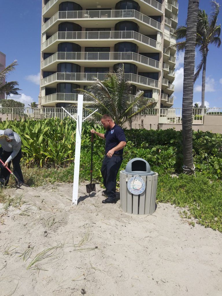 Person Next to a Bucket Tree